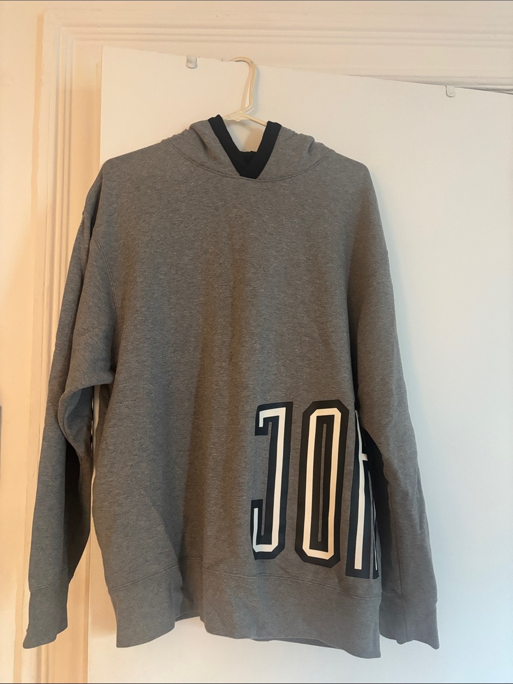 JORDANNike Gray Hooded Sweatshirt with Side '10' Graphic.